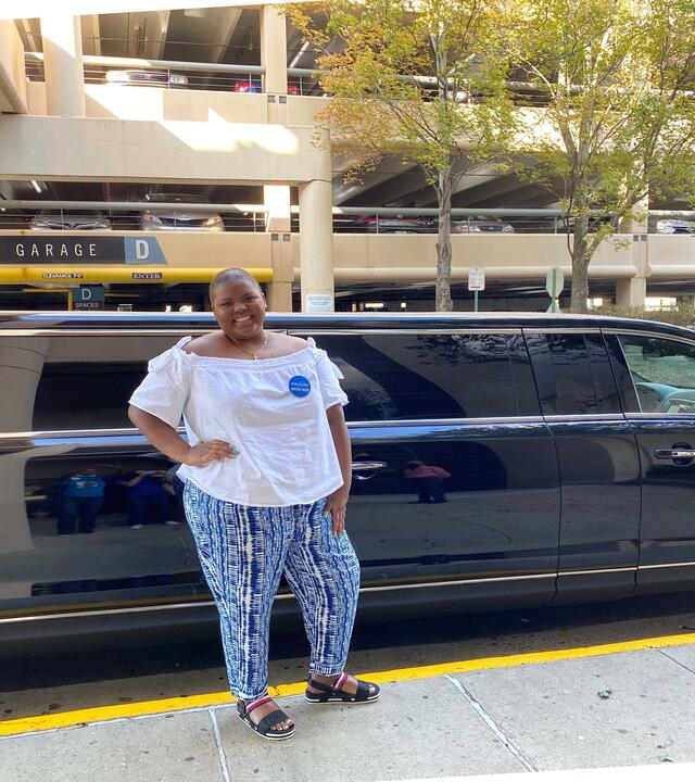 Melisa next to her limo