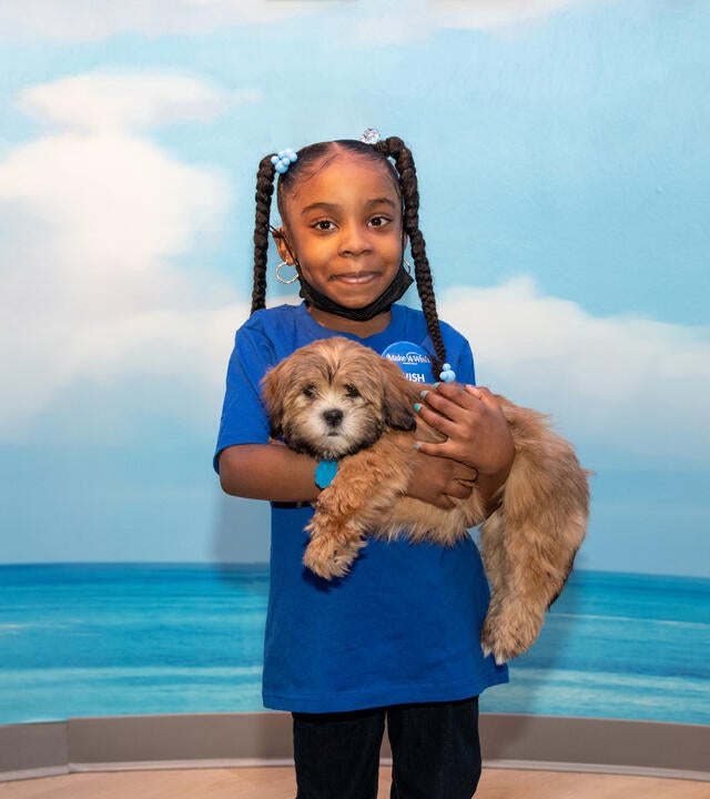 Wish Kid Kennadi with puppy