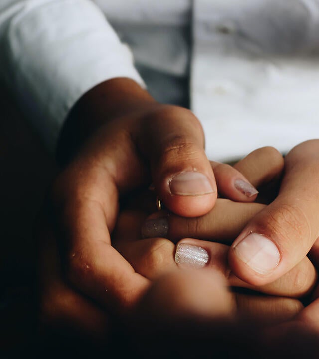 Doctor holding hands
