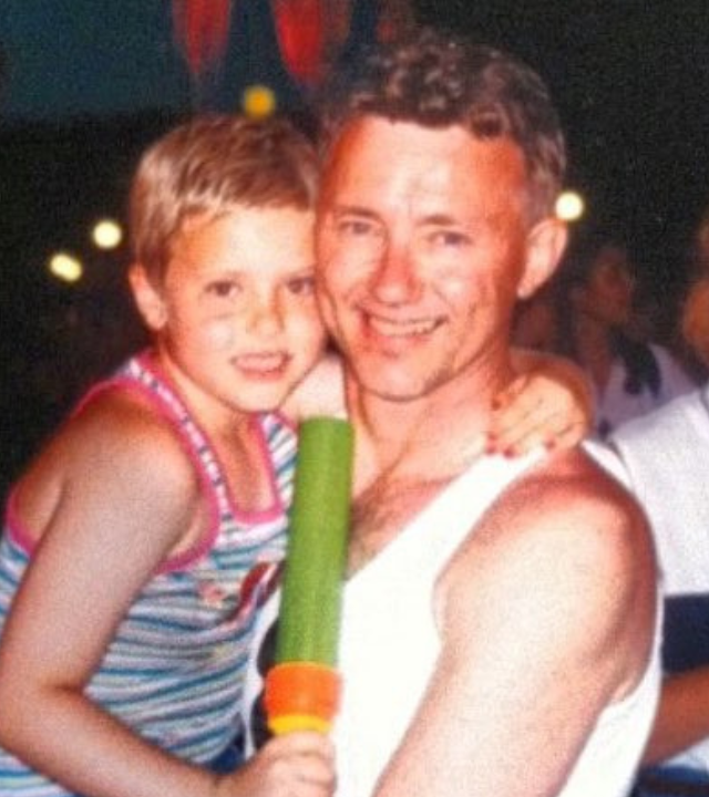 Elizabeth in Disney World with her dad 