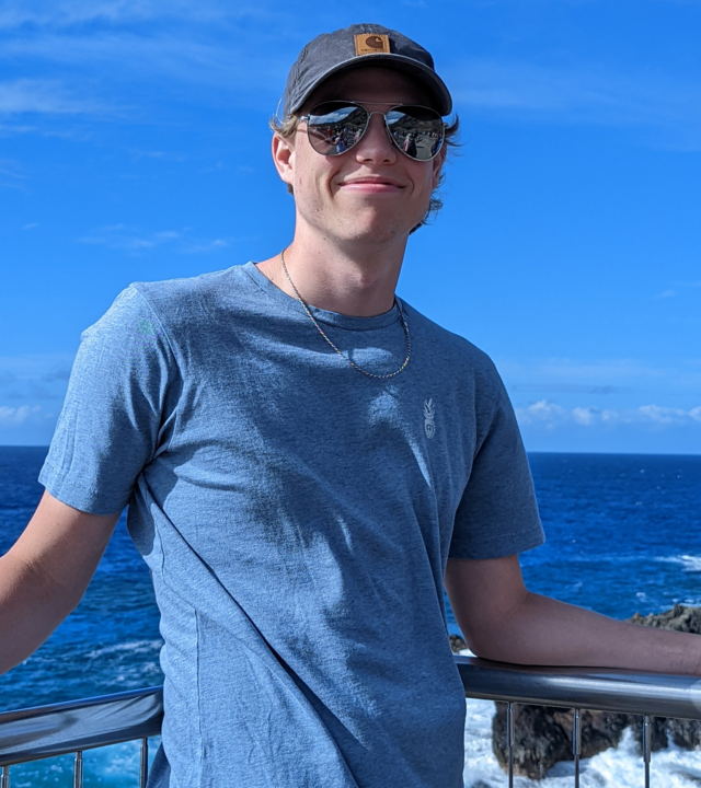 James smiling on the waterfront
