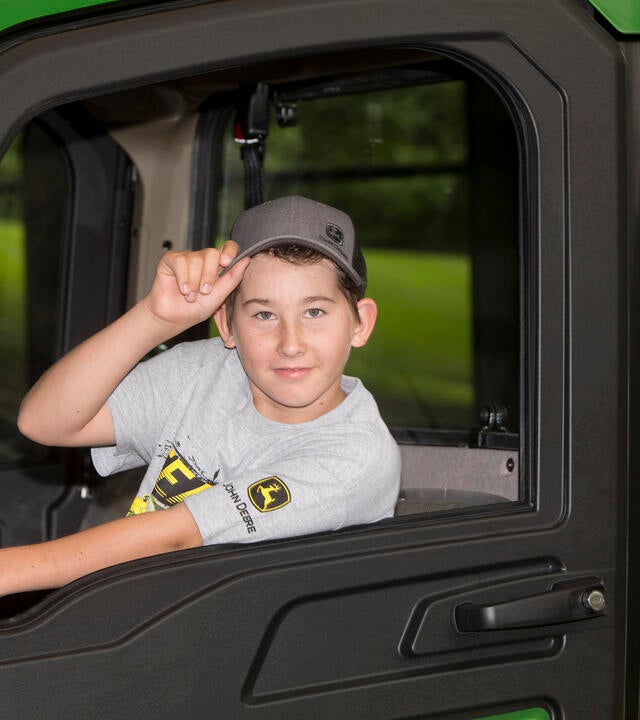 Westyn, 12, wished to visit the John Deere Factory