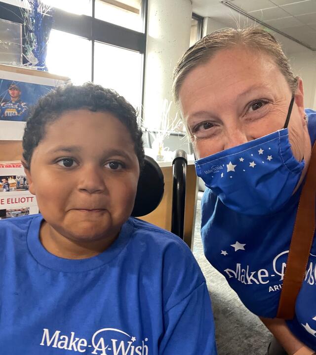 Asea with wish kid Chase at the American Airlines gate