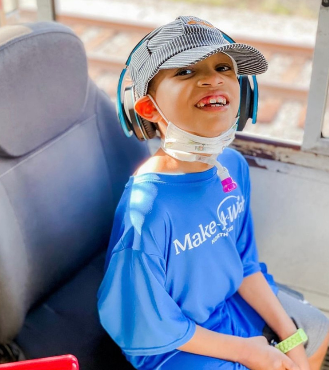 Wish kid Lorenzo on a train