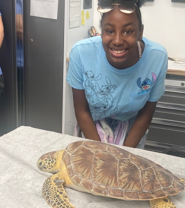 Kailyn with a turtle