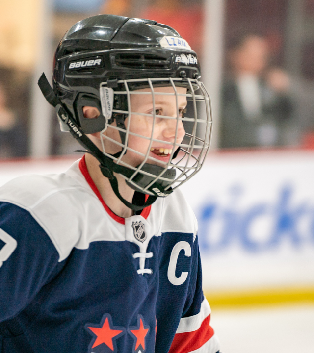 Liam on the ice with the Caps