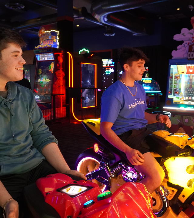 wish kids playing at Dave & Buster's