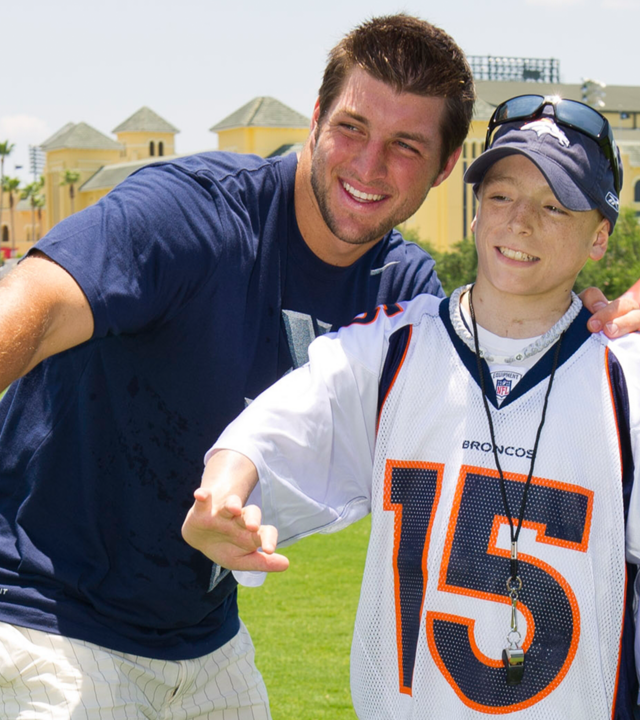 Tim Tebow meets wish kid Adam