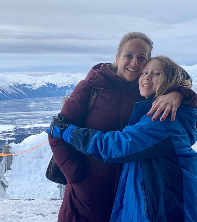 Yuval and mom in front of mountains