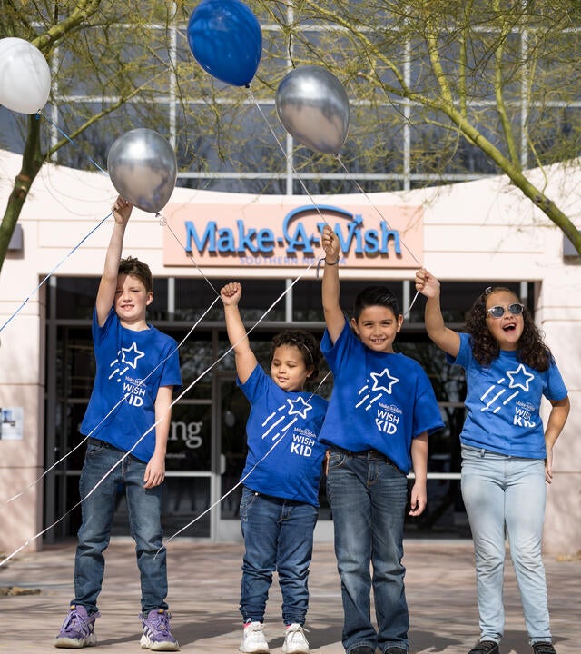 Walk for Wishes Ambassadors holding balloons