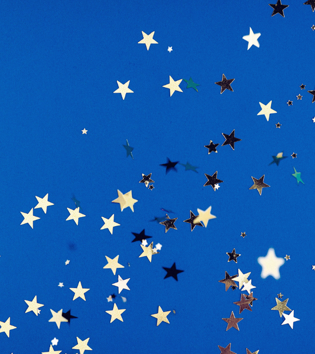 Star confetti on blue background