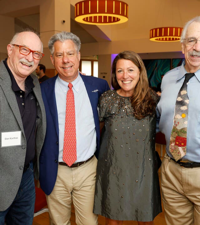 Dan Karthas, Dr. Paul Fischer, and CEO Betsy Biern, and Bob Montgomery enjoying the Wish Insiders Summit in 2023