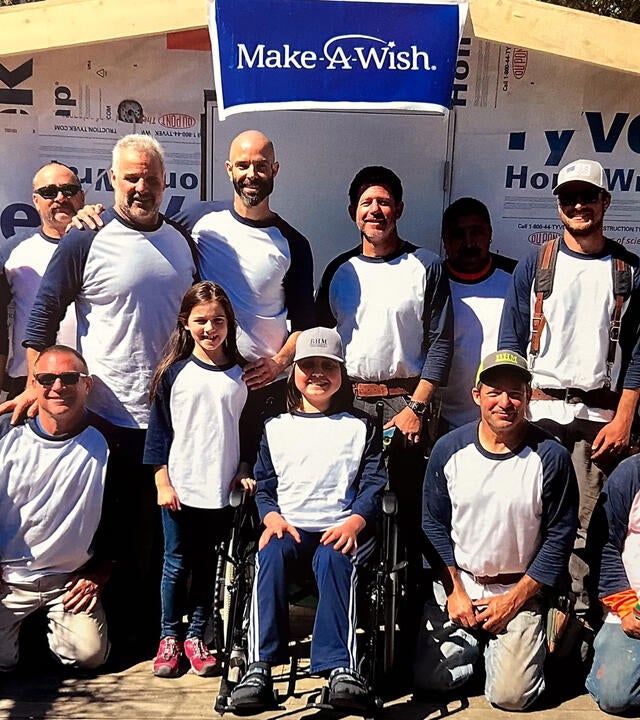 BHM Construction team with Rowan at his wish celebration.