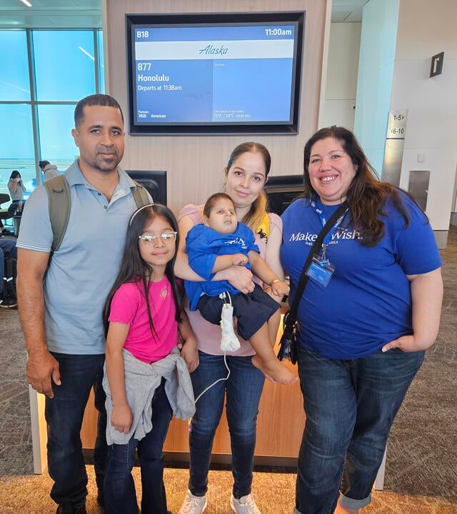 Pictured above from left to right: Wish dad Salome: Emiliano's sister Alexa: wish mom Maria; wish kid Emiliano; and wish granter Cristina Gonzalez during Emiliano's send off to Aulani.