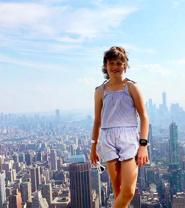 Wish Kid Alice in front of NYC Skyline