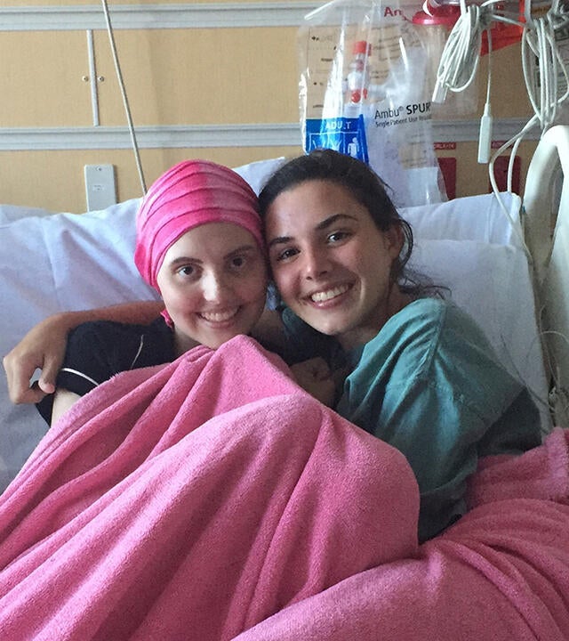 Elizabeth and sister in hospital bed