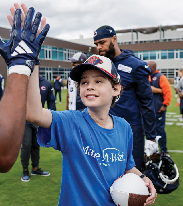Asher meets Chicago Bears players