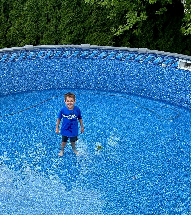 Khyden standing in his empty pool