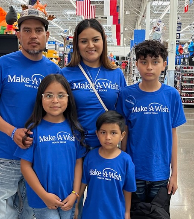 Axel and his family at his shopping spree wish