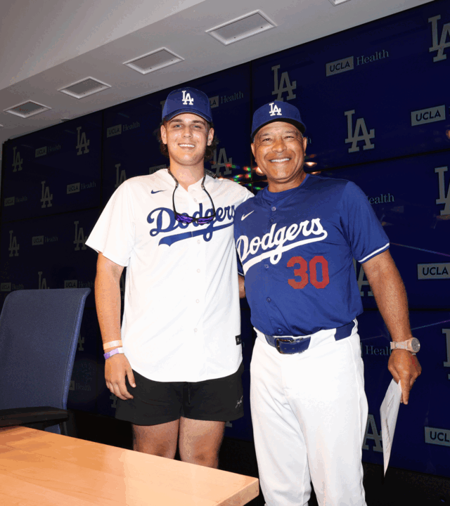 Braxton and the Dodger's business manager standing together