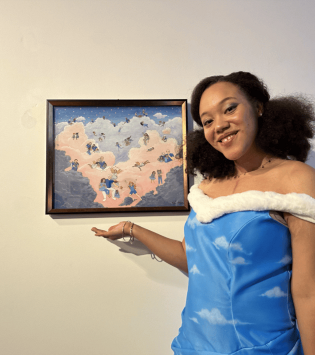 adult appearing young woman (Katina) standing next to hear artwork creation