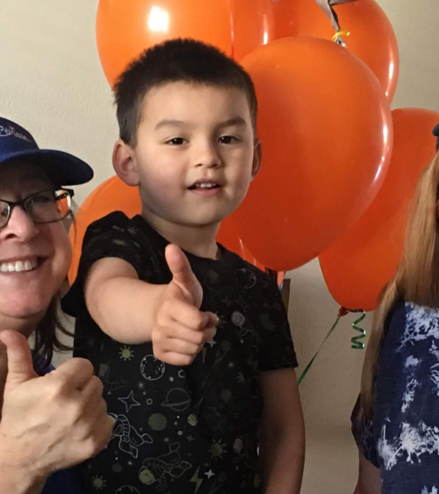 Volunteer wish granters Dana Smith and Debi Hanselman during a wish reveal