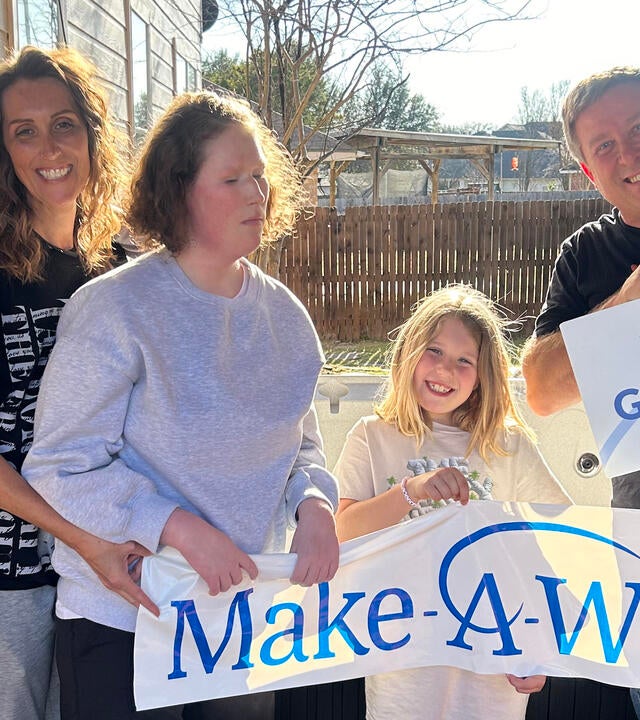 photo of Oliana and her family on wish day