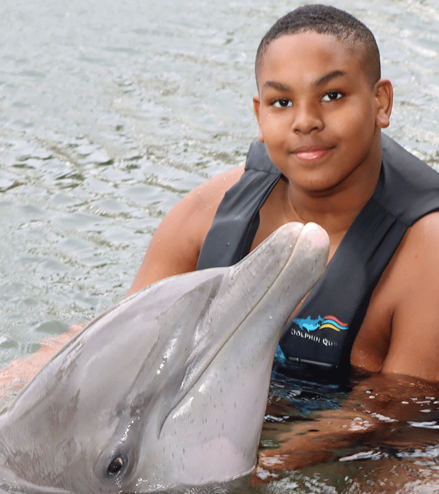 Khamari with a dolphin