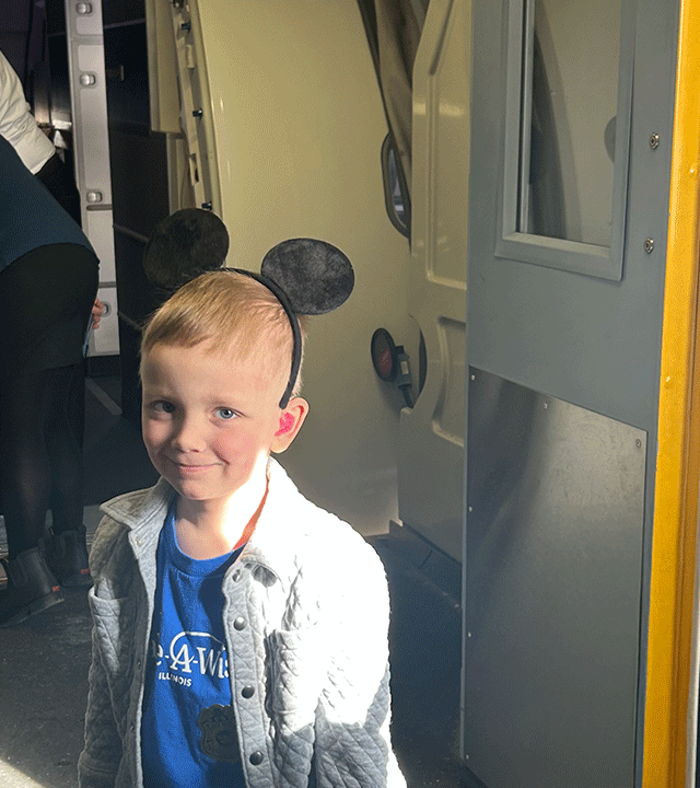 Leif boarding airplane