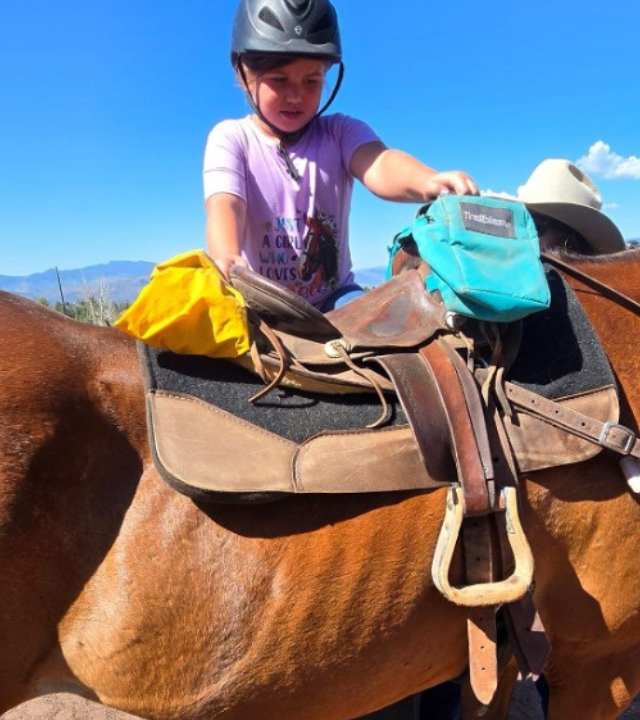 Olivia horseback riding during her wish