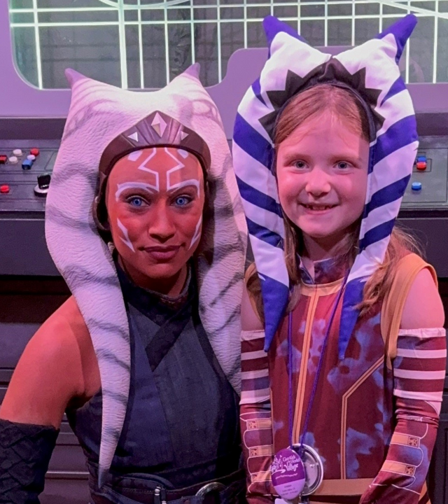 Wish kid Graysen, 6, with her hero, Star Wars character Ahsoka, at Disney World