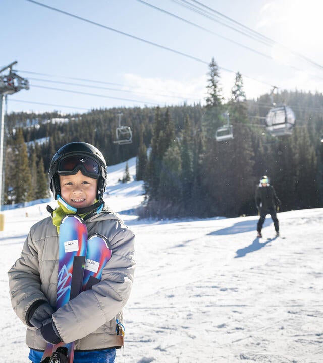 Wish kid Levi on ski mountain during wish day