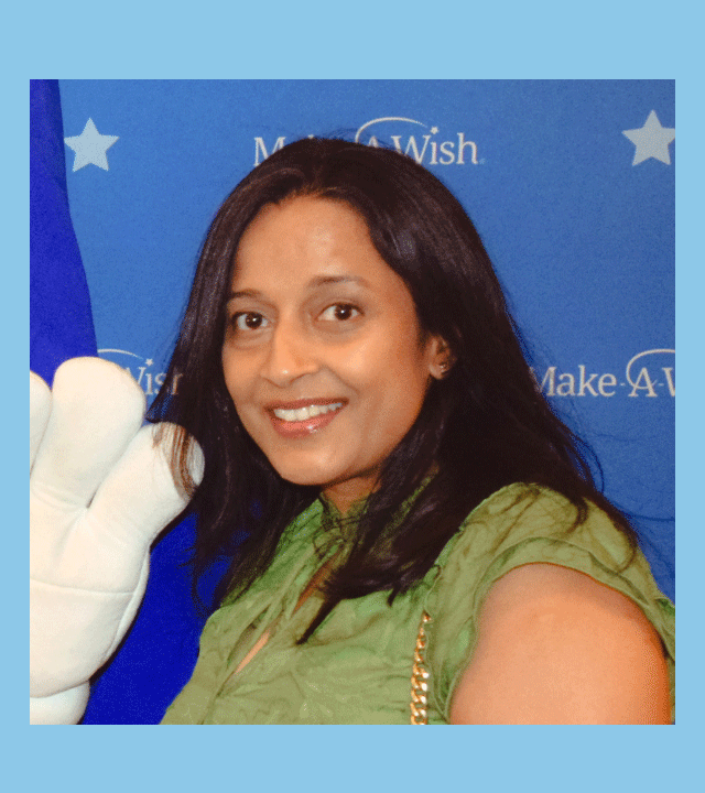 Dr. Dharia smiling in a photo