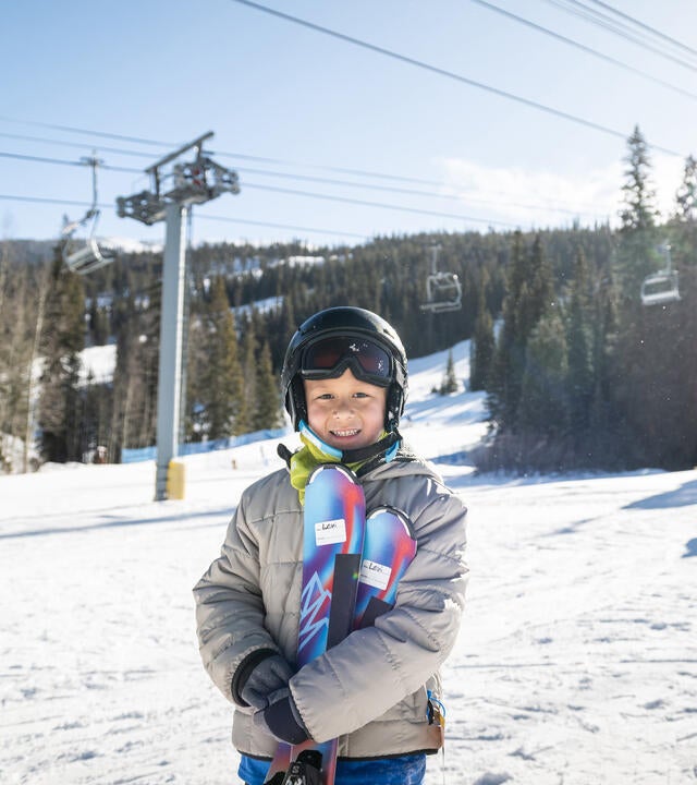 Wish kid Levi on the mountain for his skiing wish