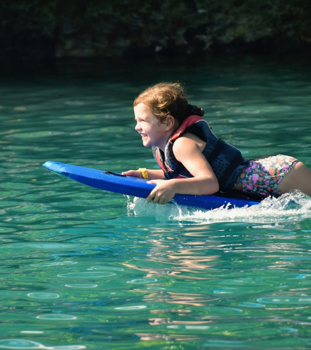 Cora boogie boarding in the Bahamas