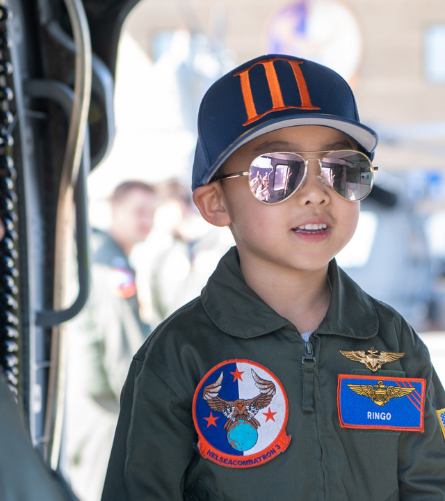 Ringo tours a helicopter at Naval Air Station North Island with HSC-3. 