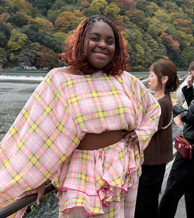Bee in a pink dress posing for the camera