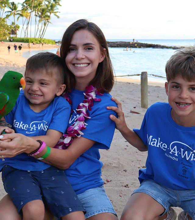 Max, mom, and brother with tucan