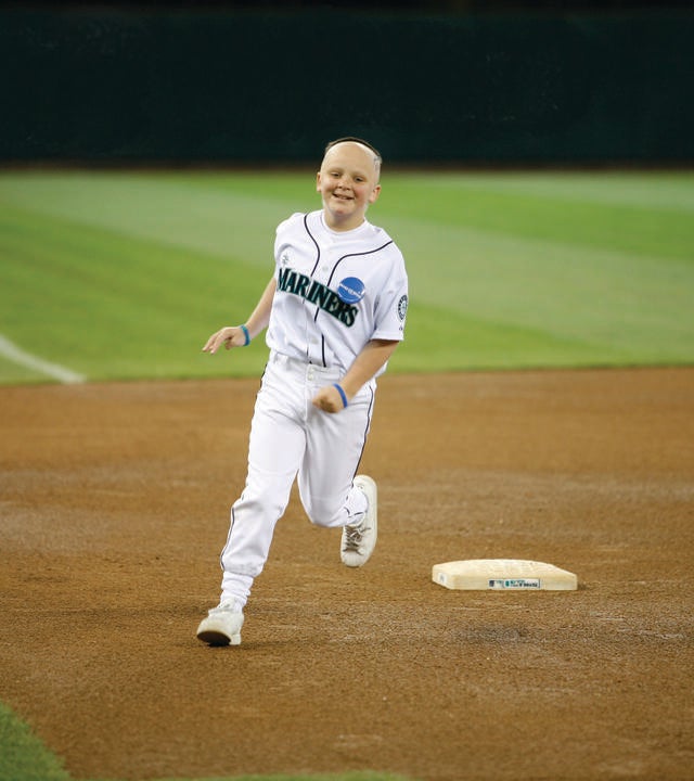 Katie Morris runs the bases at the Mariners Game