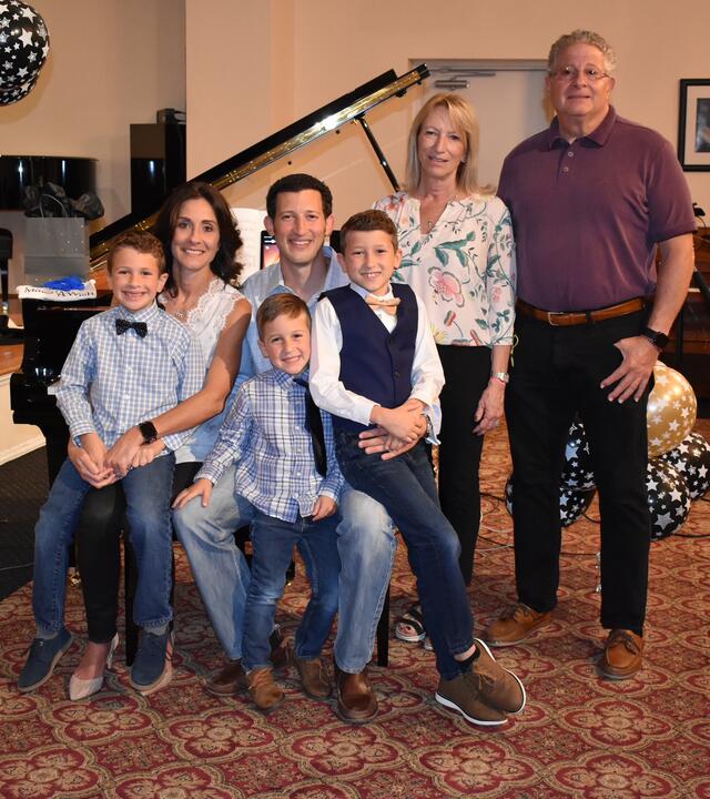 Wish kid Gavin with his family for his wish