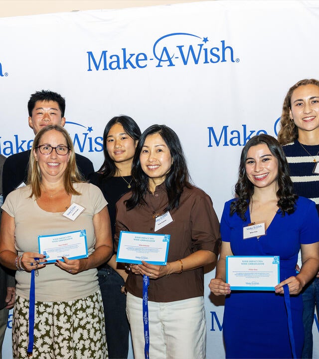 From left to right: Amy Hofmann, Bryan and Andrea Vaughn (accepting on behalf of their daughter, Amy Vaughn), Cooper Lee, Maika Ting, Viola Sutanto, Milan Alas, Lindsey Fontenot, and Andrea Alford.