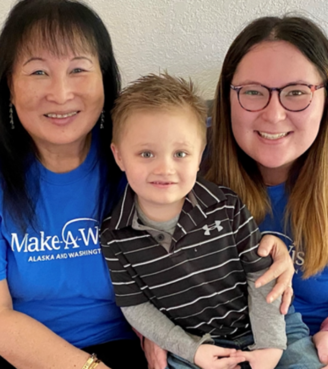 Volunteer Teresa with wish kid and daughter