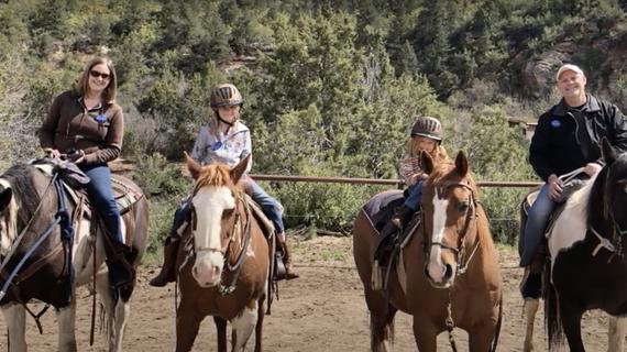 Emma and family on the dude ranch