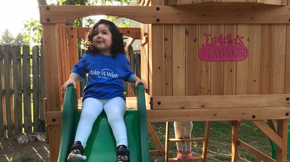 Wish kid Isabella enjoys her new playset.
