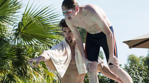 Brayden getting coaching lessons from Michael Phelps.