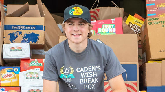 Caden at a food drive in support of his wish