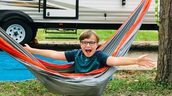 Ethan in hammock while camping