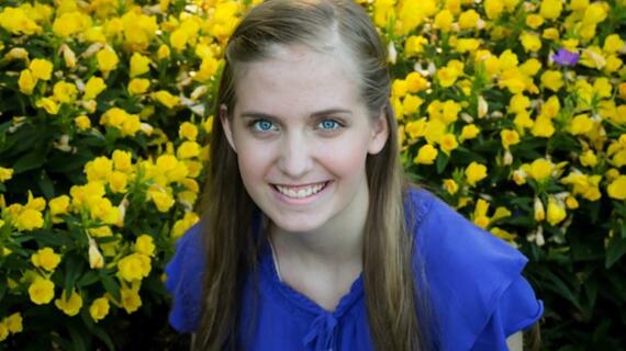Girl with yellow flowers 