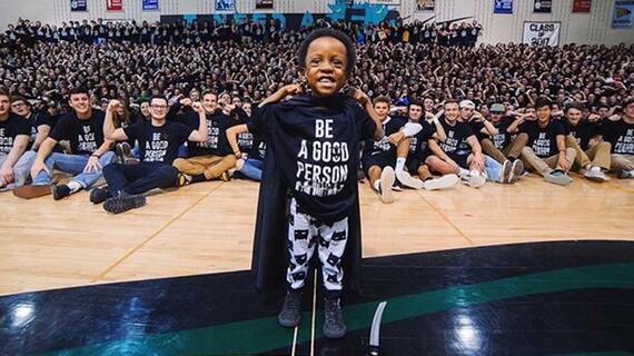 wish kid in front of student body