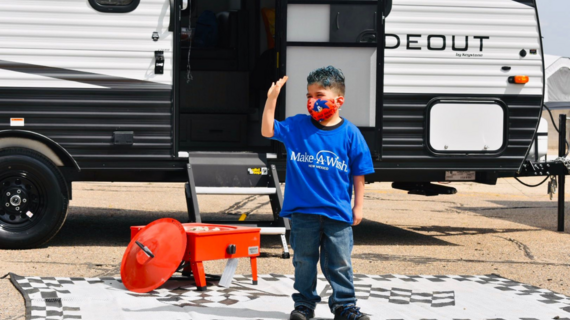 Marcos in front of camper 